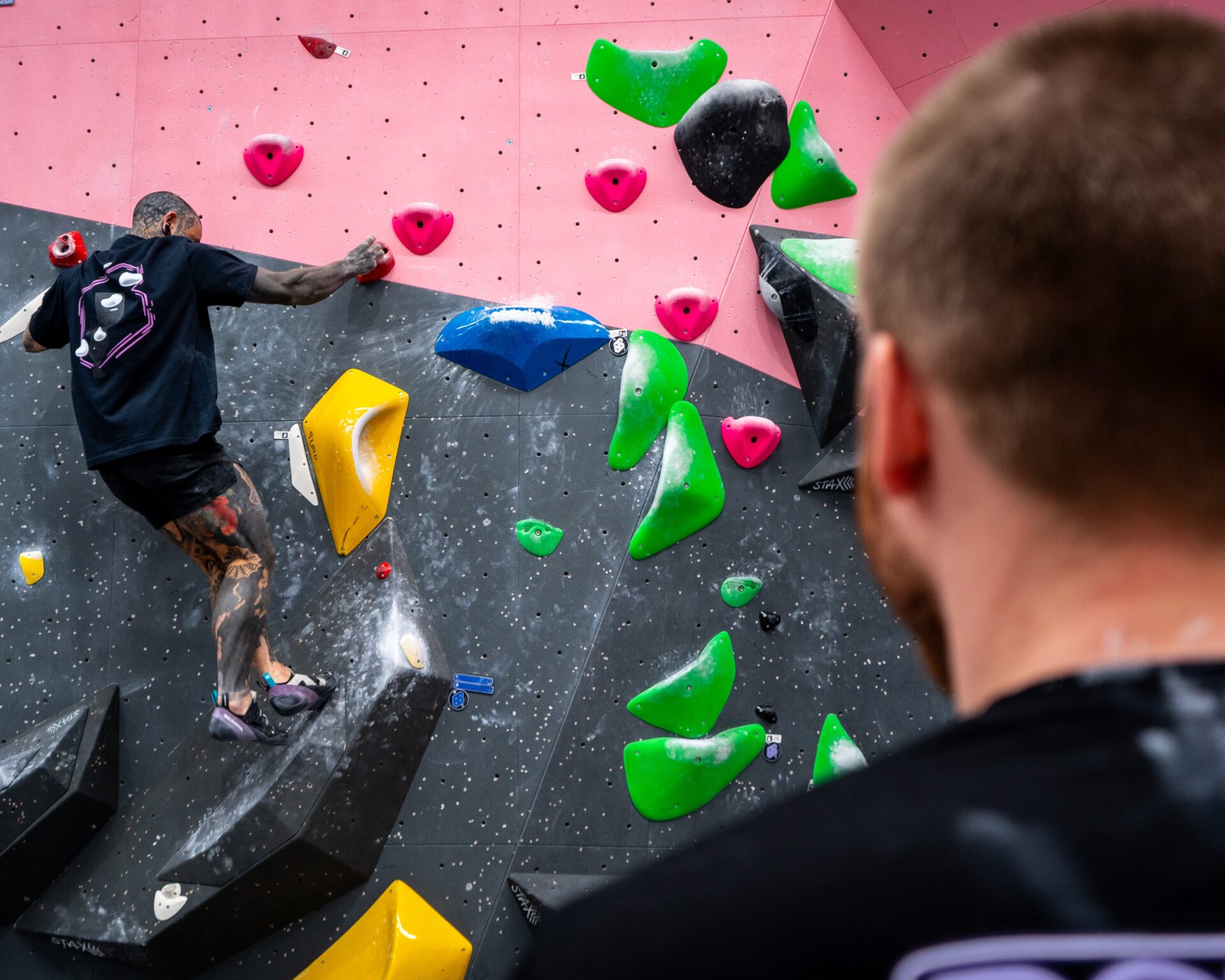 Corporate team bonding over a climbing team-building session at Beyond Bouldering